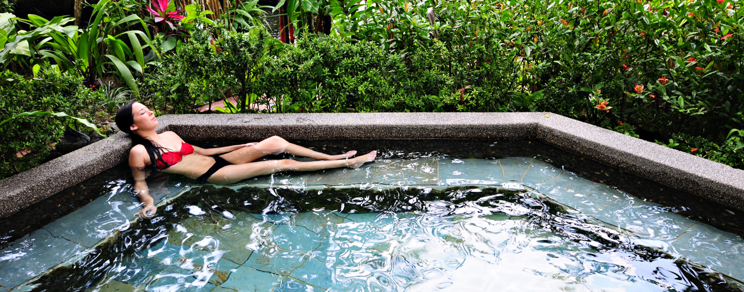 A young women enjoys surrounding of nature