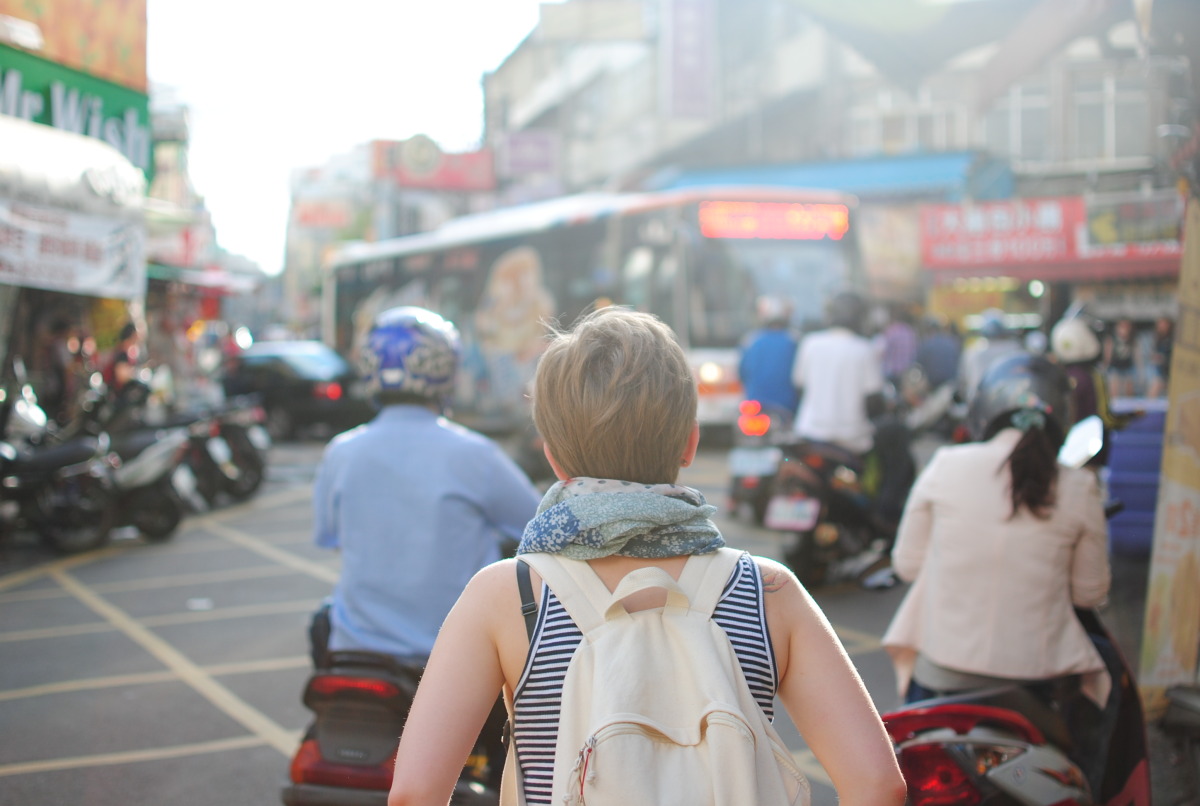 The girl explores the city